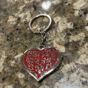 DollyWood Heart Shaped Keychain Vintage with Similar diamonds on both sides.